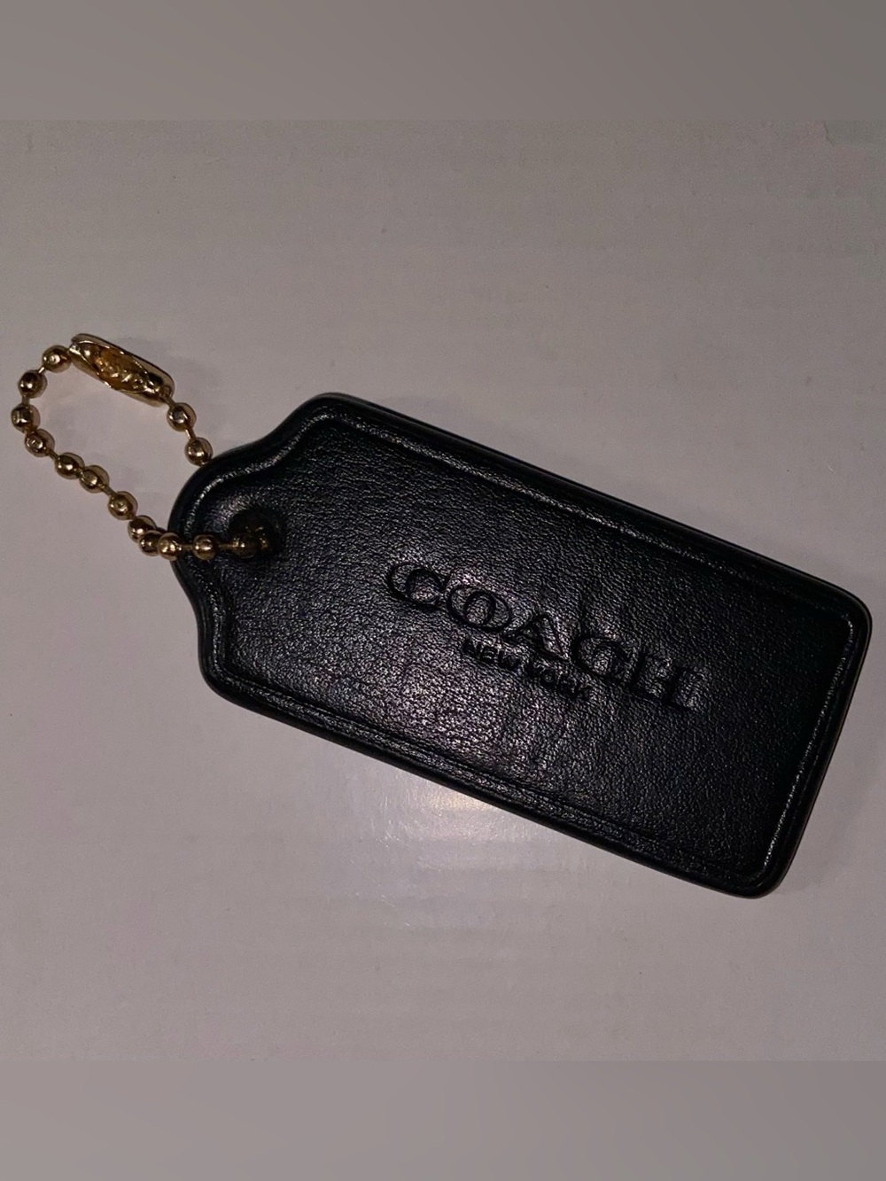 COACH TAG